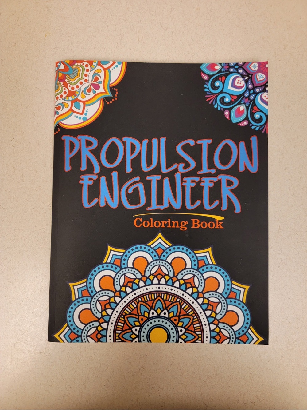 Propulsion Engineer Coloring Book - Black with Blue and Orange Accents
